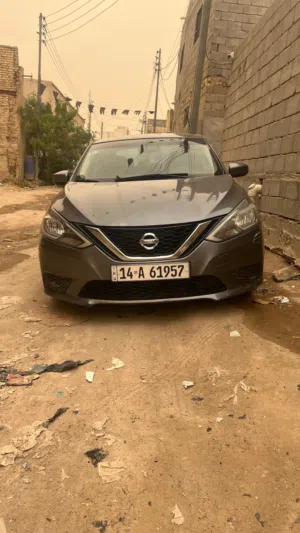 نيسان سنترا وارد امريكي تقرير غرق 30% سياره جاهزه وحلوه بدي مكفول كير مكينه خير من الله السياره بسمي