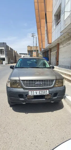 فورد اكسبلورر ذهبي موديل 2005 بغداد رقم جديد