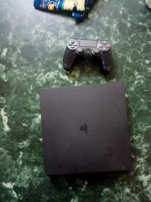 PS4 Slim 500GB بحالة ممتازة + 27 لعبة + ذراع أصلي