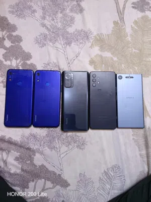 سوني  شاومي هواوي 2 Samsung a32 مجموعة تلفونات عاطلة قسم بس شاشة واحد بطارية منفوخة