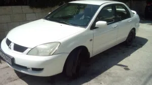 متسوبيشي لانسر 2007 GLX  مرخصه و مؤمنه  ماتور 1600 cc  جير اوتوماتيك  غرفة الشركه لون بيج نظيفه