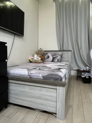 Grey bed frame (mattress not included)
