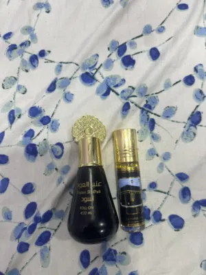 عطر عنبر العود اسود 22ملي و عطر الحرم من السعوديه مع سبحه مجانيه