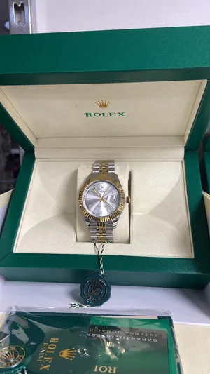 Rolex . Analog Quartz . Beige0