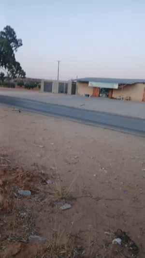 2300متر على الرئيسي ترهونةمجي للبيع أو الاستبدال
