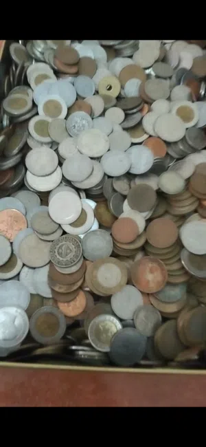 10 كيلو من العملات المنوعة لبلدان مختلفة