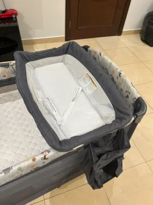 4 in 1 co-sleeper. can be used as a side bed play pen or changing station. totally new in condition
