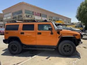 سيارة هامر H2 موديل 2004 SUV برتقالي مع كامل المواصفات الخليجية