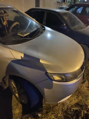 سيارة كيا سيراتو موديل 2012 لون رمادي بحالة جيدة مع مواصفات خليجية