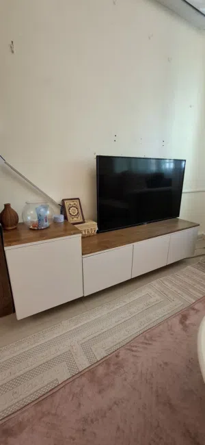 طاولة تلفزيون تفصيل