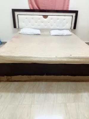 Double bed with Double Mattress and Two pillows