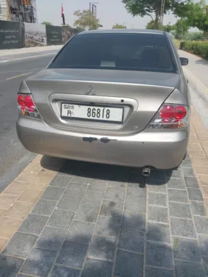 mitsubishi lancer with 2006 with GCC specs, GL, 4 door sedan and 4 cylinders for sale