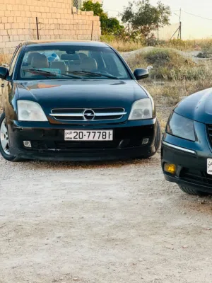 اوبل فكترا سي 2003