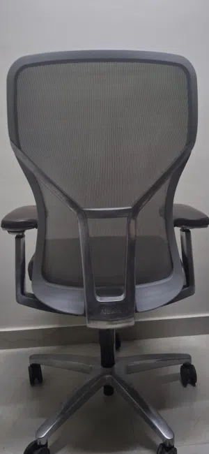 Allsteel Acuity task chair with a dark brown leather seat and mesh back