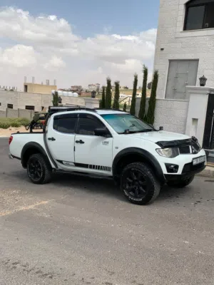 بكم ميتسوبيشي ل200  2014 للبيع او للبدل على سبورتيرو