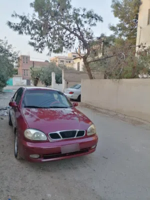 دايو لانوس موديل 1999 لون خمري