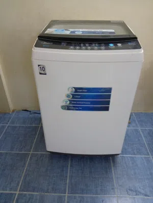 Midea 10kg top-loading automatic washing machine_ looks like new غسالة فوق اتوماتيك ميديا 10كيلو