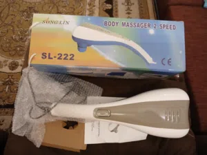Body massager handheld electronic device used for vibration massage  Brand New in Box