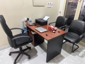 office desk with three chairs