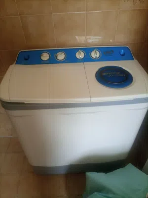غساله حوضين بحاله جيده 12 كيلو