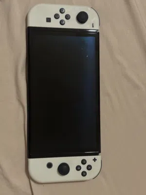 للبيع Nintendo Switch OLED أبيض نظيف و سعر خيال