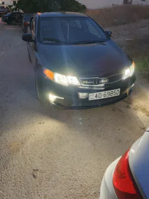 كيا سيراتو LX 2013 كوبيه أسود بيفور أسود مع مواصفات كورية ولوك موديل مميز