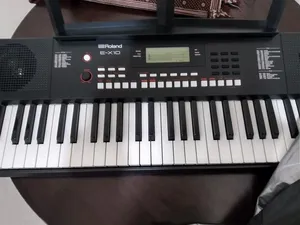 Roland ex 10 with package  عرض بيانو رولاند إي إكس 10
