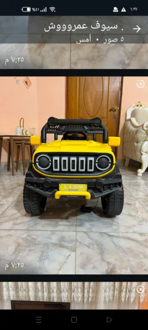سيارة اطفال لون اصفرنظافتهامثل مابالصورة اخت الجديدة