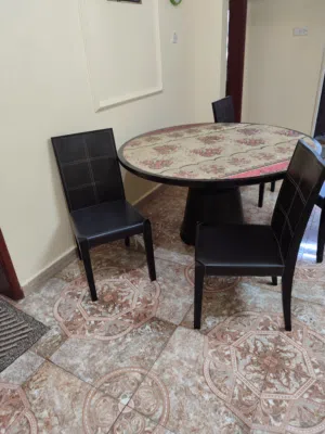 Wooden round shaped dining table with leather coated chairs. No damages, looks like new. Urgent sale