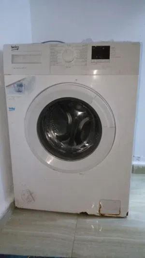 غساله بحال جديد وشغالة وماشاءالله عليه