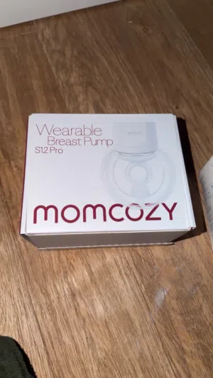 Momcozy شفاطة حليب مع حفاضات جديدة مجاناً