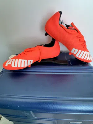 Bran new Puma soccer shoes with pins