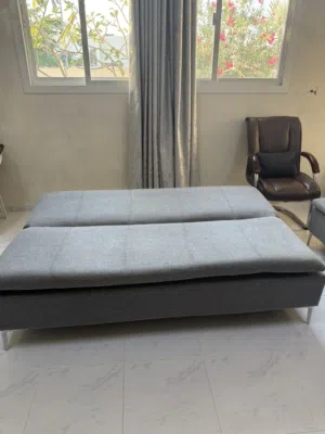 كنبه تتحول لسرير لون رصاصي جميل من رويال للمفروشات