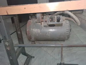 طاولة خياطه سنجر مع ماتور شغال
