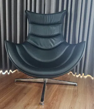Black leather cocoon swivel chair