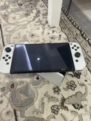 Nintendo Switch OLED ذاكره 128 gp تقدر تزيدها و نضيفه ما استخدمته وايد و محافظ عيها