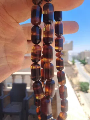مسبحة كهرمان عنبر سومتي خراطه يدويه حجر واحد