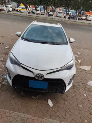 كورلاء 2017 لون ابيض  ماشيه 140,000 بصمه  فتحة سقف