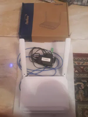 راوتر WiFi 5G FiberHomeUmnia(جديد بالكرتونه لم يستعمل موديل 2025).ذو كفاءه وسرعه عاليه(جديد وكاله).