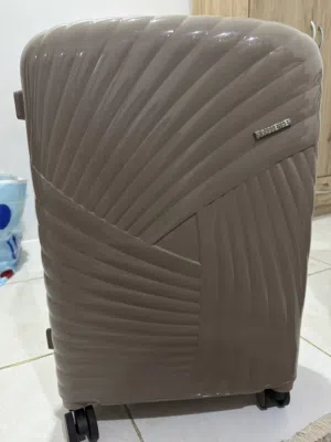 شنط سفر لون برونز