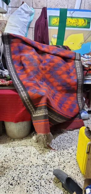 سجادة منسوجة يدويآ