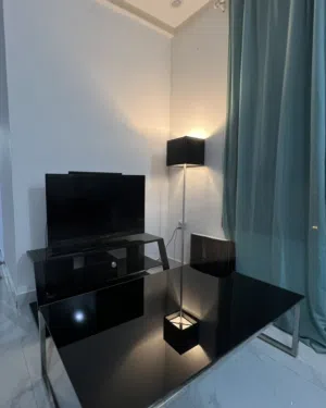 Set of Tv with stand and a coffee table