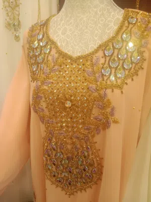 I have a business of Jalabiya dresses, I make them and sell them. The price of one dress is 35 OMR