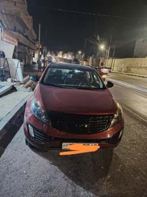 كيا سبورتاج 2012  مستعمل لون خمري بحالة جيدة مع مواصفات مميزة فيها مجال اشي بسيط