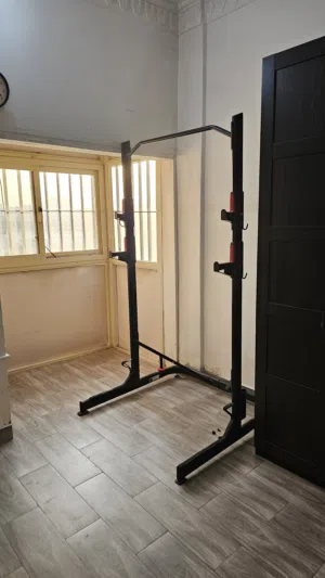 "جهاز " (Power Rack) "ستاند الأوزان" Domyos مستعمل لا يشمل البار والبنش