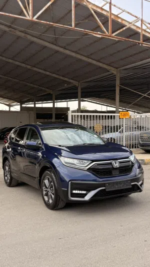 هوندا crv هايبرد EXL 2022 جمرك جديد  ممشى قليل16 الف فقط فحص 2 جيد
