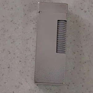 قداحة(vintage ) ماركة دنهل صناعة سويسرية فضة.