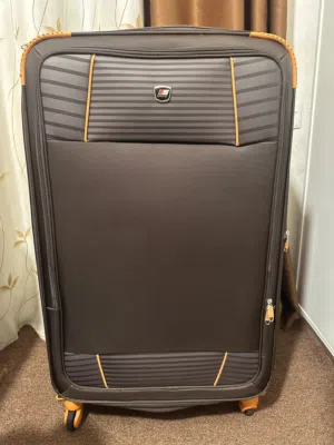 حقيبة سفر حجم متوسط الى كبير