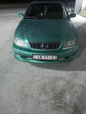 اوبل ميغا2002