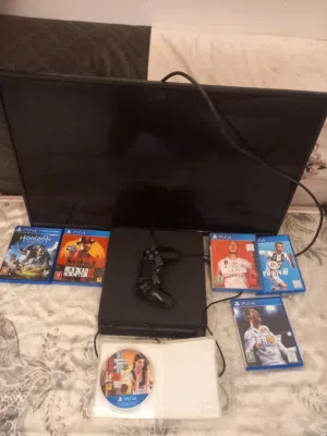 PS4 + TV + video game discs